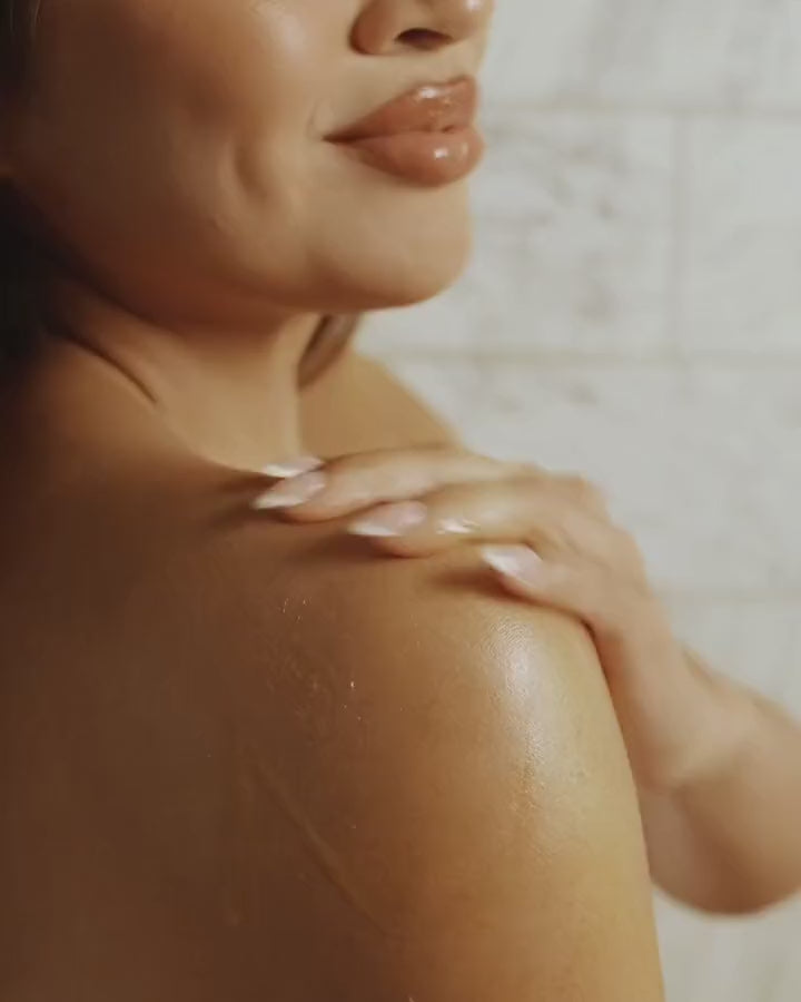 CLEO VII body oil applied to skin, absorbing with no greasy finish
